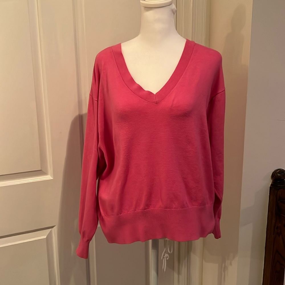 Bright pink v-neck sweater